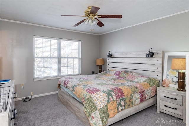 bedroom with baseboards, ceiling fan, carpet flooring, and crown molding