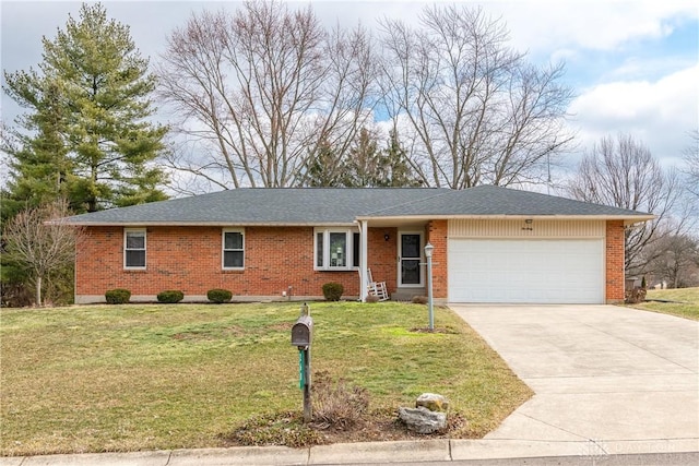 ranch-style house featuring a garage, brick siding, a shingled roof, driveway, and a front yard