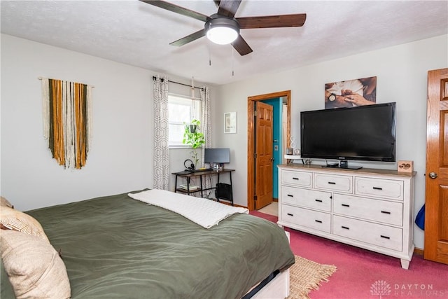 carpeted bedroom featuring a ceiling fan