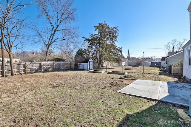 view of yard featuring a patio and a fenced backyard