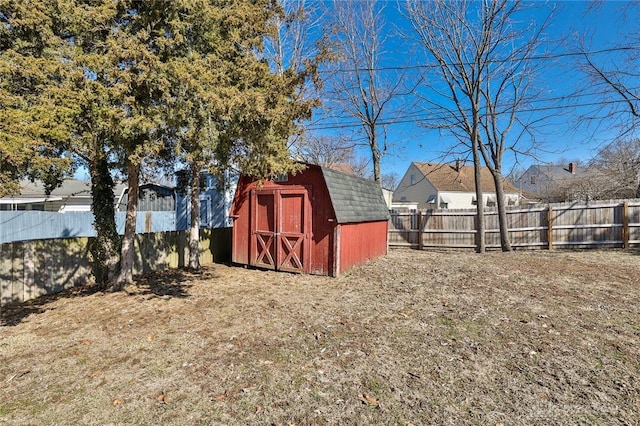 view of shed featuring a fenced backyard