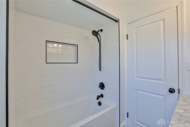 bathroom featuring  shower combination