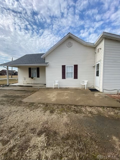 back of house with a patio area