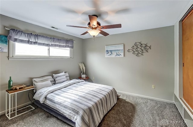 carpeted bedroom with ceiling fan, visible vents, and baseboards