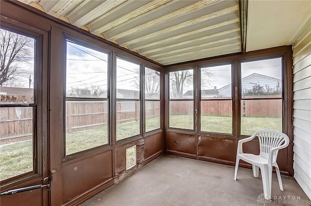 unfurnished sunroom featuring a healthy amount of sunlight