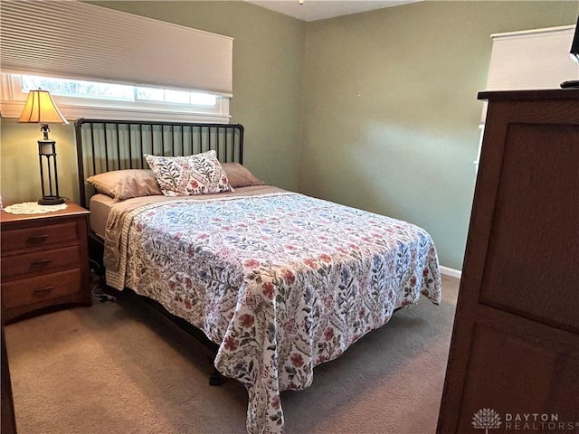 bedroom featuring carpet flooring