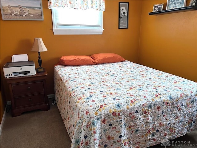 bedroom featuring carpet