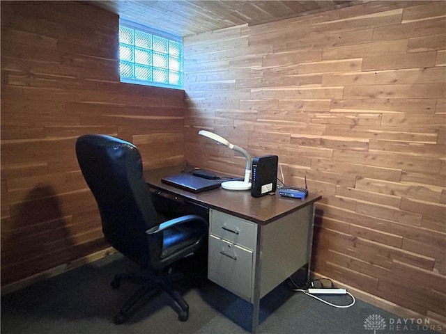 office area with wood walls and wooden ceiling