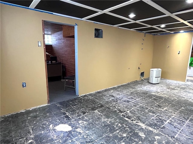 interior space featuring coffered ceiling