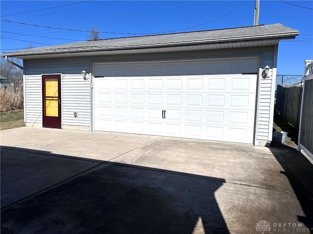 detached garage with fence