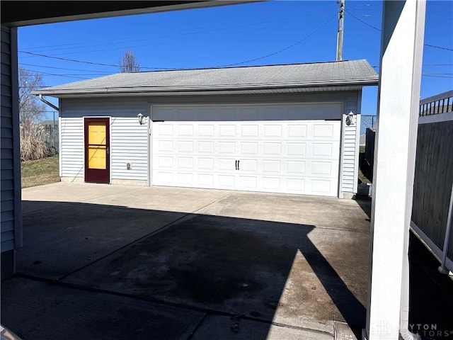 detached garage with fence