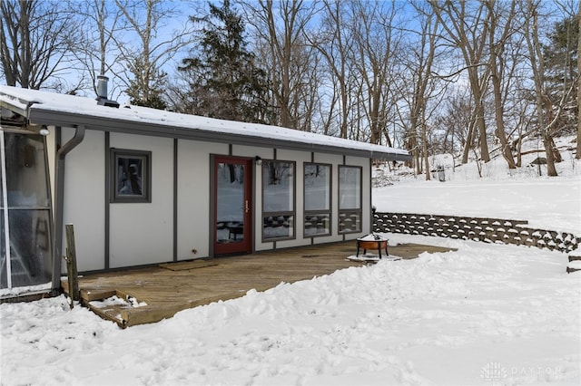 view of snow covered property