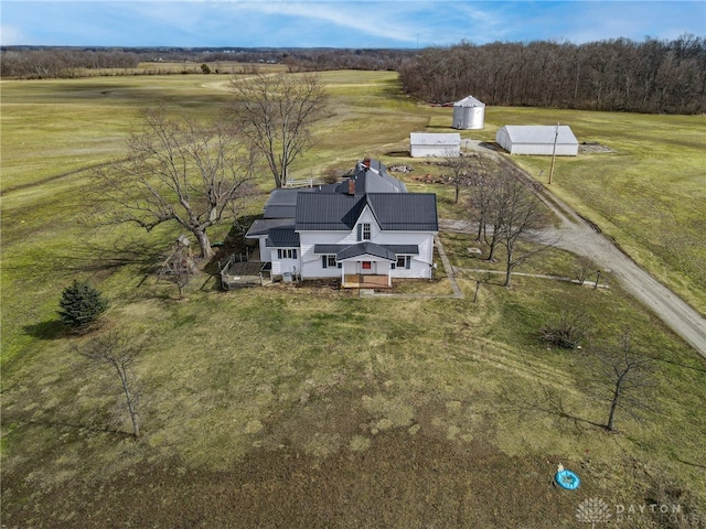 birds eye view of property with a rural view