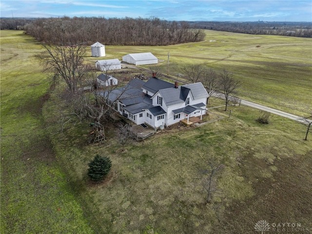 birds eye view of property with a rural view