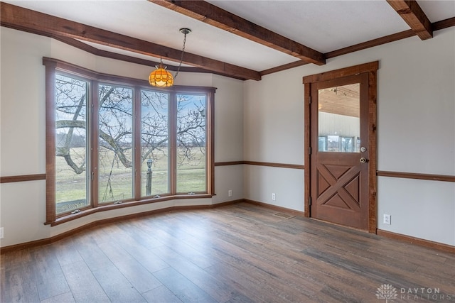 unfurnished dining area with baseboards, wood finished floors, and a healthy amount of sunlight