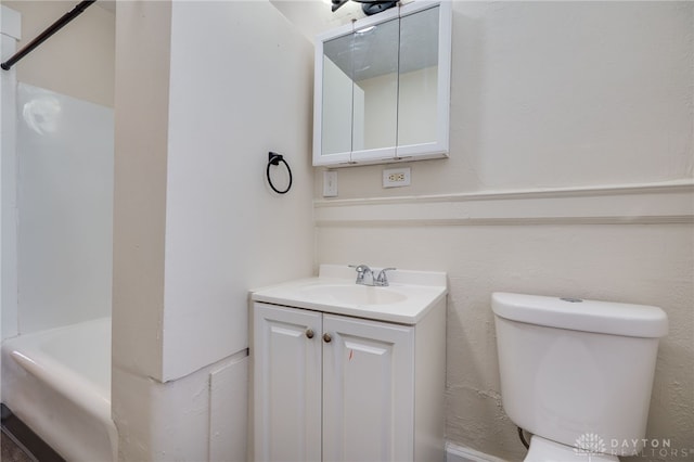 bathroom with toilet, a shower, a bathtub, and vanity