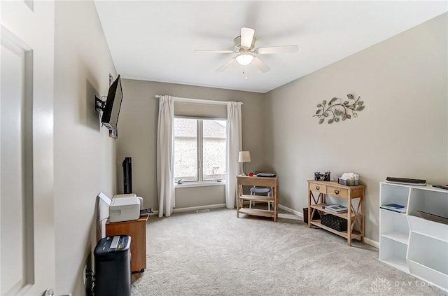 rec room featuring carpet, a ceiling fan, and baseboards