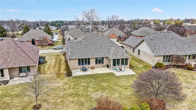 drone / aerial view with a residential view