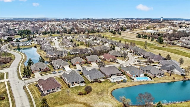 aerial view featuring a water view and a residential view