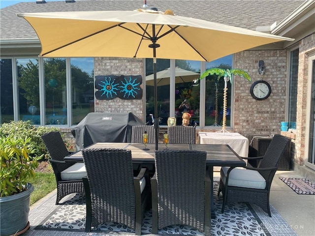 view of patio / terrace featuring outdoor dining area and area for grilling