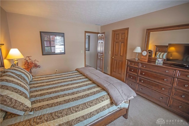 1250 Yankee Woods Dr, Washington Twp, OH 45458 - bedroom featuring carpet flooring and a textured ceiling