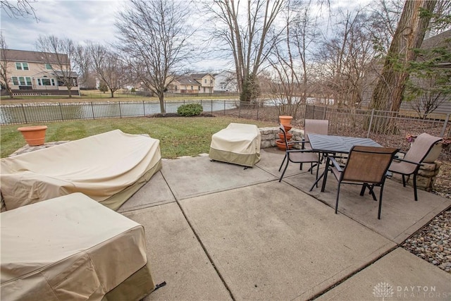 view of patio / terrace featuring outdoor dining area, a fenced backyard, and a grill