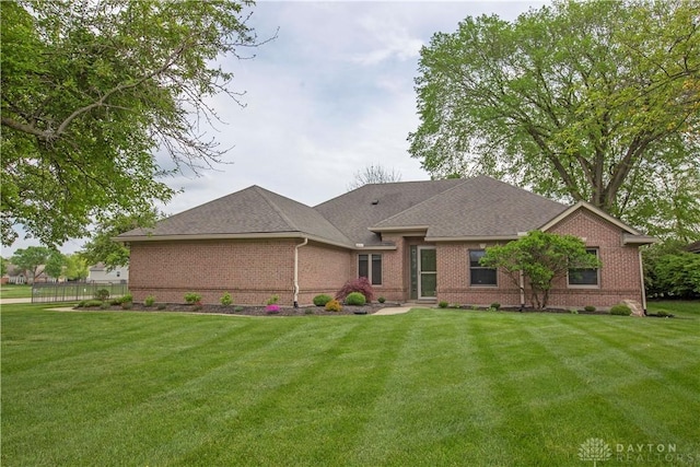 1250 Yankee Woods Dr, Washington Twp, OH 45458 - view of front facade with brick siding and a shingled roof