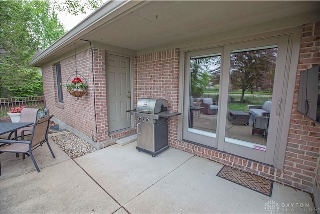 1250 Yankee Woods Dr, Washington Twp, OH 45458 - view of patio / terrace featuring a grill and fence