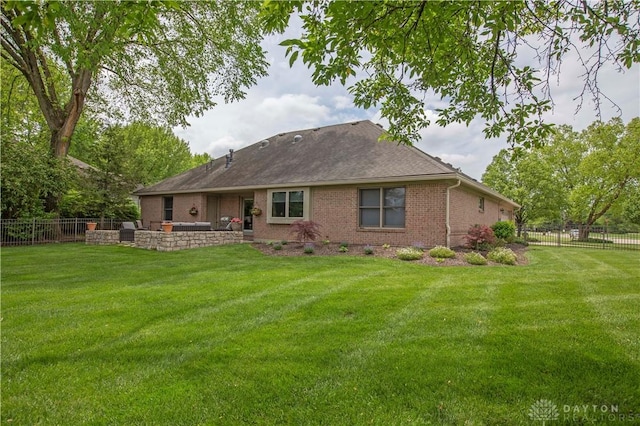 1250 Yankee Woods Dr, Washington Twp, OH 45458 - rear view of house featuring brick siding, a patio area, and a shingled roof