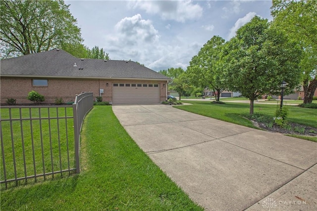 1250 Yankee Woods Dr, Washington Twp, OH 45458 - view of front of property featuring concrete driveway, an attached garage, and brick siding