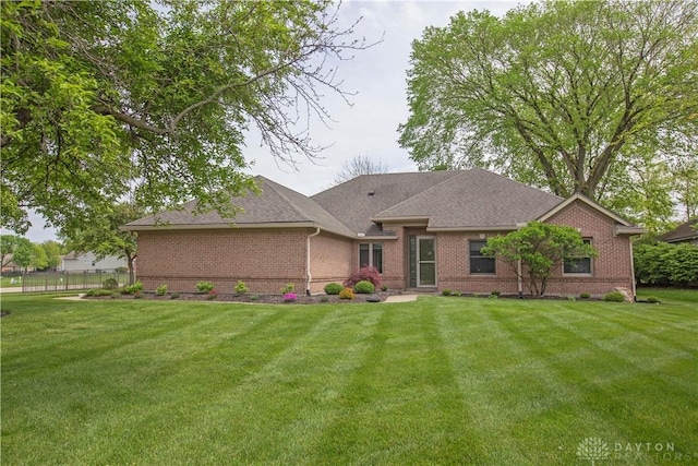 1250 Yankee Woods Dr, Washington Twp, OH 45458 - view of front facade featuring brick siding and roof with shingles