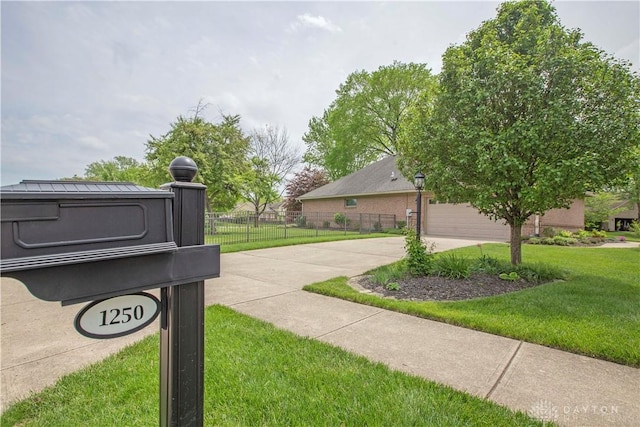 1250 Yankee Woods Dr, Washington Twp, OH 45458 - exterior view of fence and concrete driveway