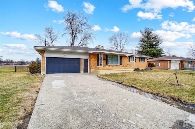 single story home featuring an attached garage, brick siding, fence, driveway, and a front lawn