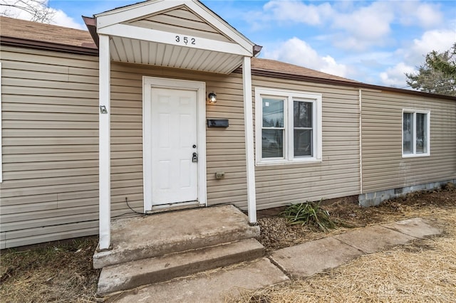 doorway to property featuring crawl space