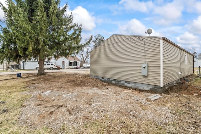 view of property exterior featuring crawl space