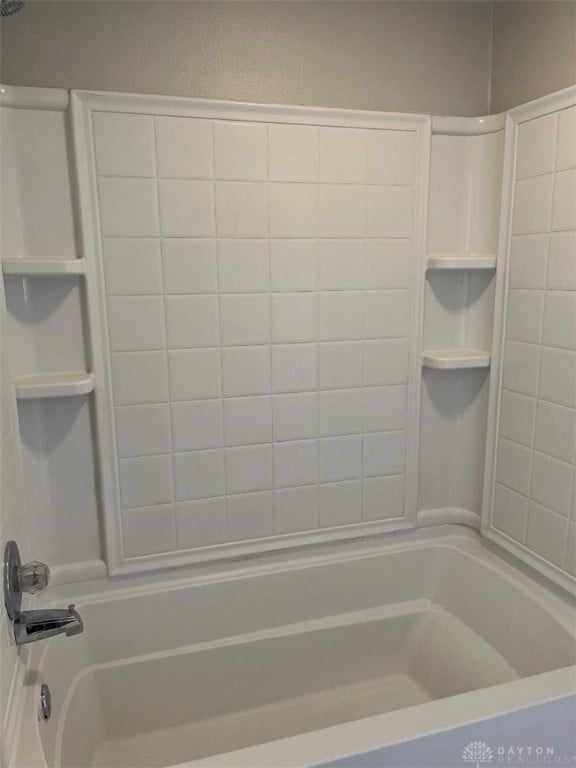 bathroom featuring shower / washtub combination