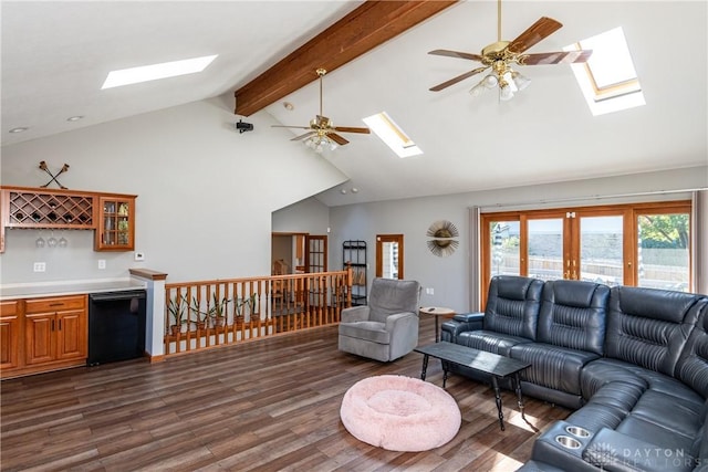 living room with a dry bar, ceiling fan, dark wood-type flooring, beamed ceiling, and high vaulted ceiling