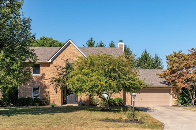 obstructed view of property featuring driveway, brick siding, a chimney, and a front yard