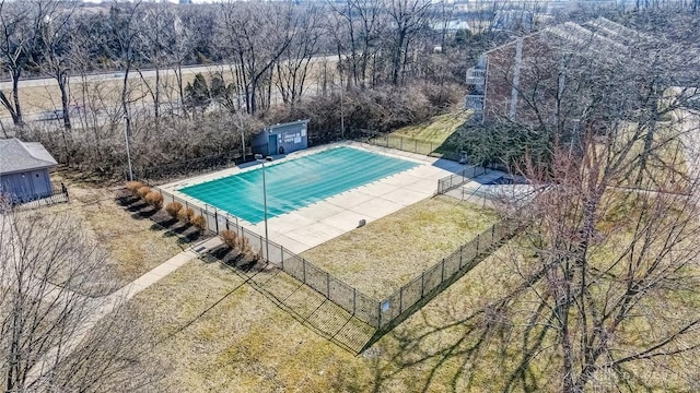 view of pool featuring a fenced in pool, a yard, fence, and a patio