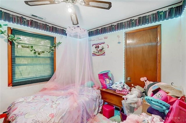 bedroom featuring visible vents and a ceiling fan