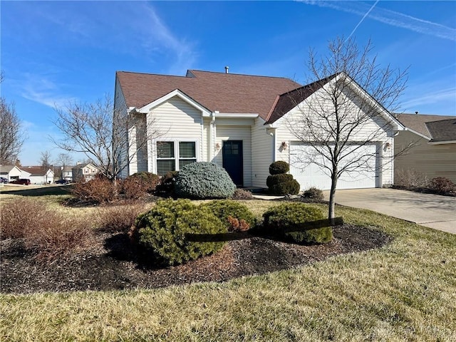 view of front of property with driveway, a garage, and roof with shingles