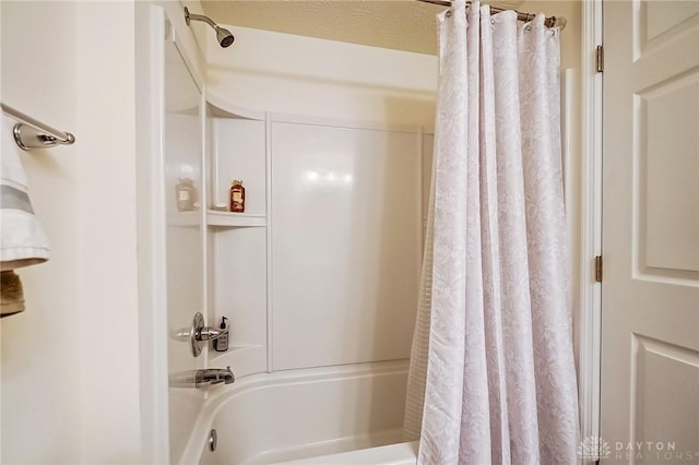 bathroom featuring shower / bathtub combination with curtain