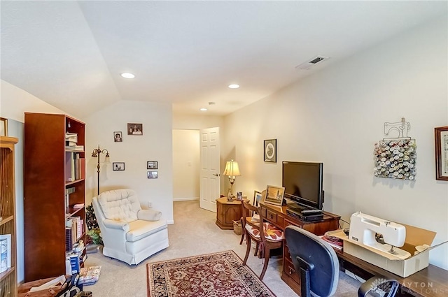 office space with vaulted ceiling, recessed lighting, visible vents, and light colored carpet