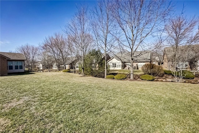 view of yard with a residential view