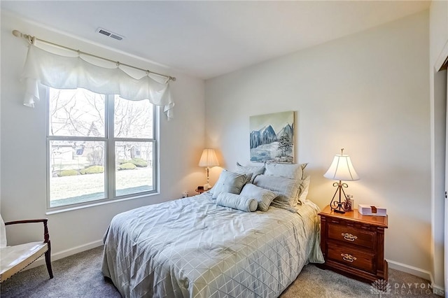 bedroom featuring carpet, visible vents, and baseboards