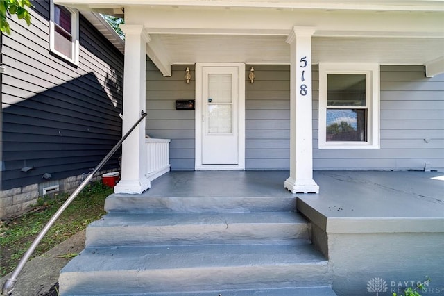 property entrance with a porch