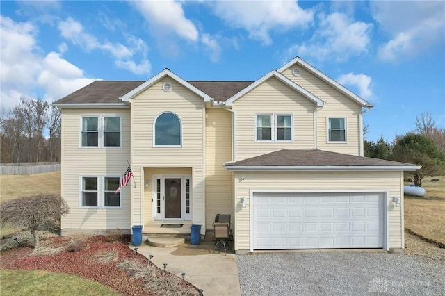 view of front of home featuring driveway and an attached garage