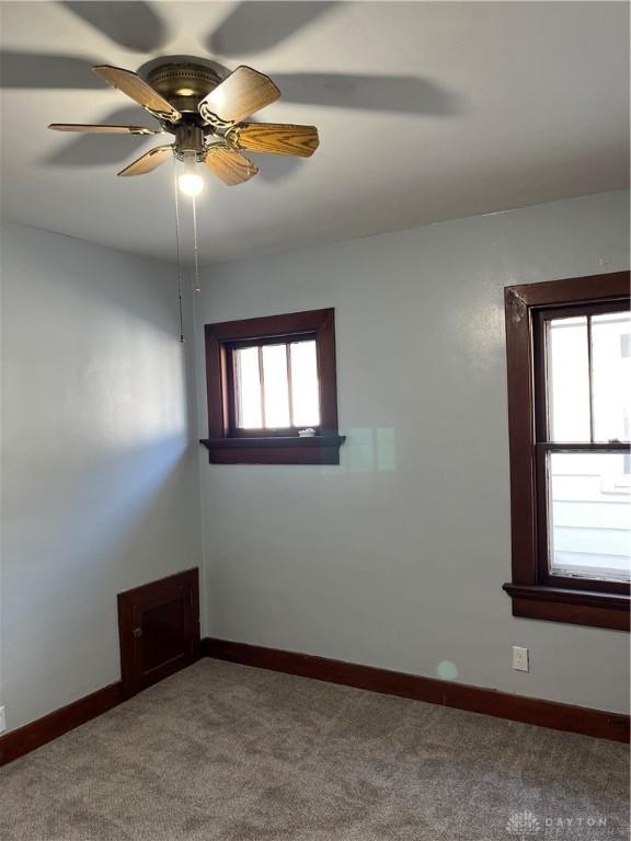 1205 Pursell Ave, Dayton, OH 45420 - carpeted empty room with a ceiling fan and baseboards