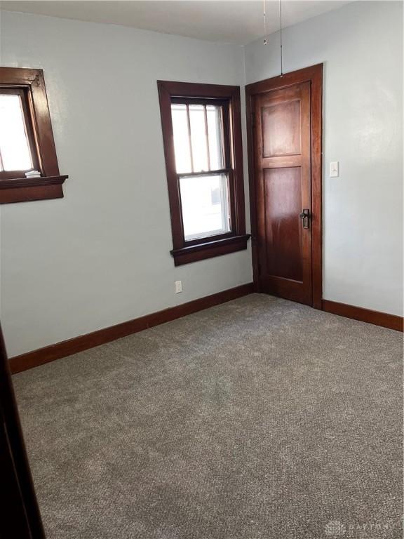 1205 Pursell Ave, Dayton, OH 45420 - carpeted spare room with baseboards
