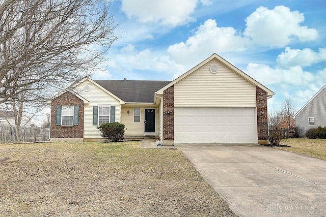 ranch-style home featuring a front yard, fence, driveway, and an attached garage